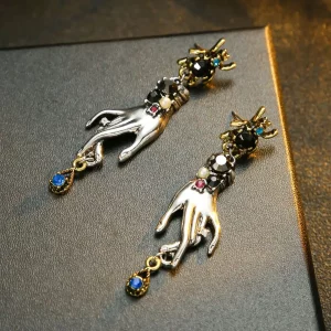 Handförmige Ohrringe mit Kristall